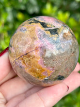 Load image into Gallery viewer, Beautiful Pink and Orange Sunset Rhodonite Sphere